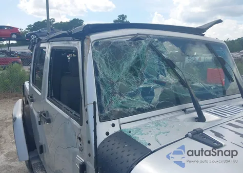 2009 Jeep Wrangler Unlimited Sahara from USA, damaged, VIN 1J4GA59149L720511